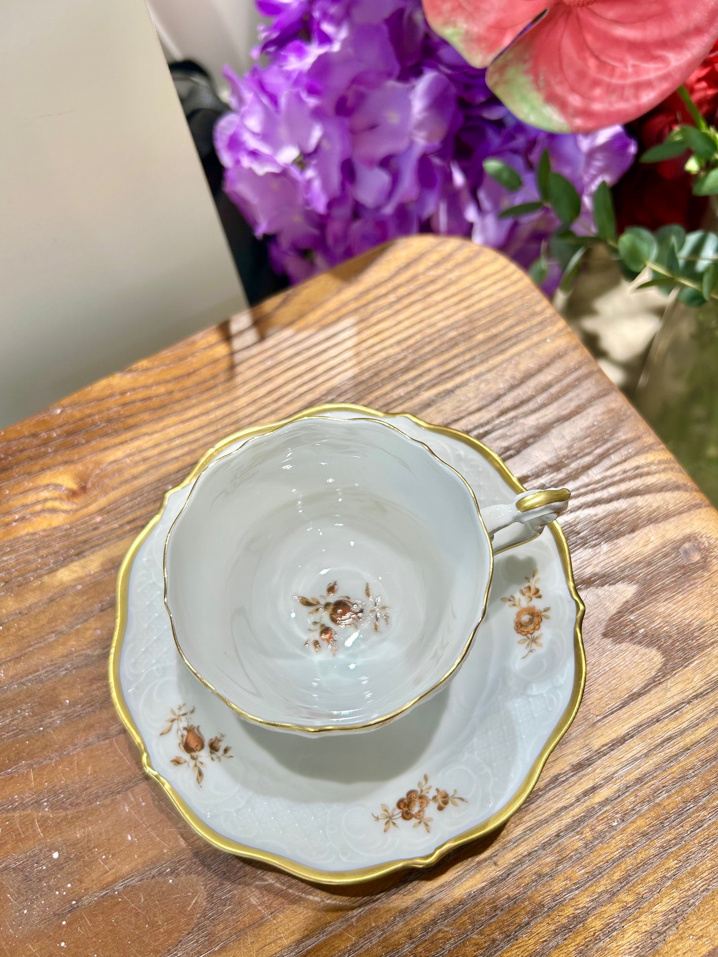 German Lindner Rococo-Style Coffee Cup – 22k Gilded Relief with Brown Floral Accents
