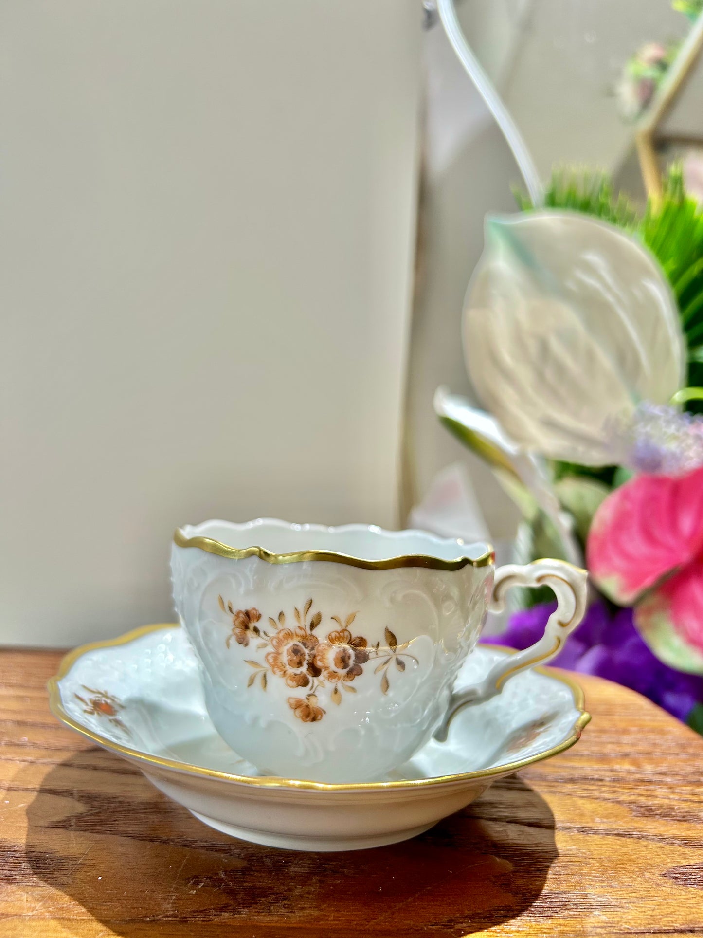 German Lindner Rococo-Style Coffee Cup – 22k Gilded Relief with Brown Floral Accents