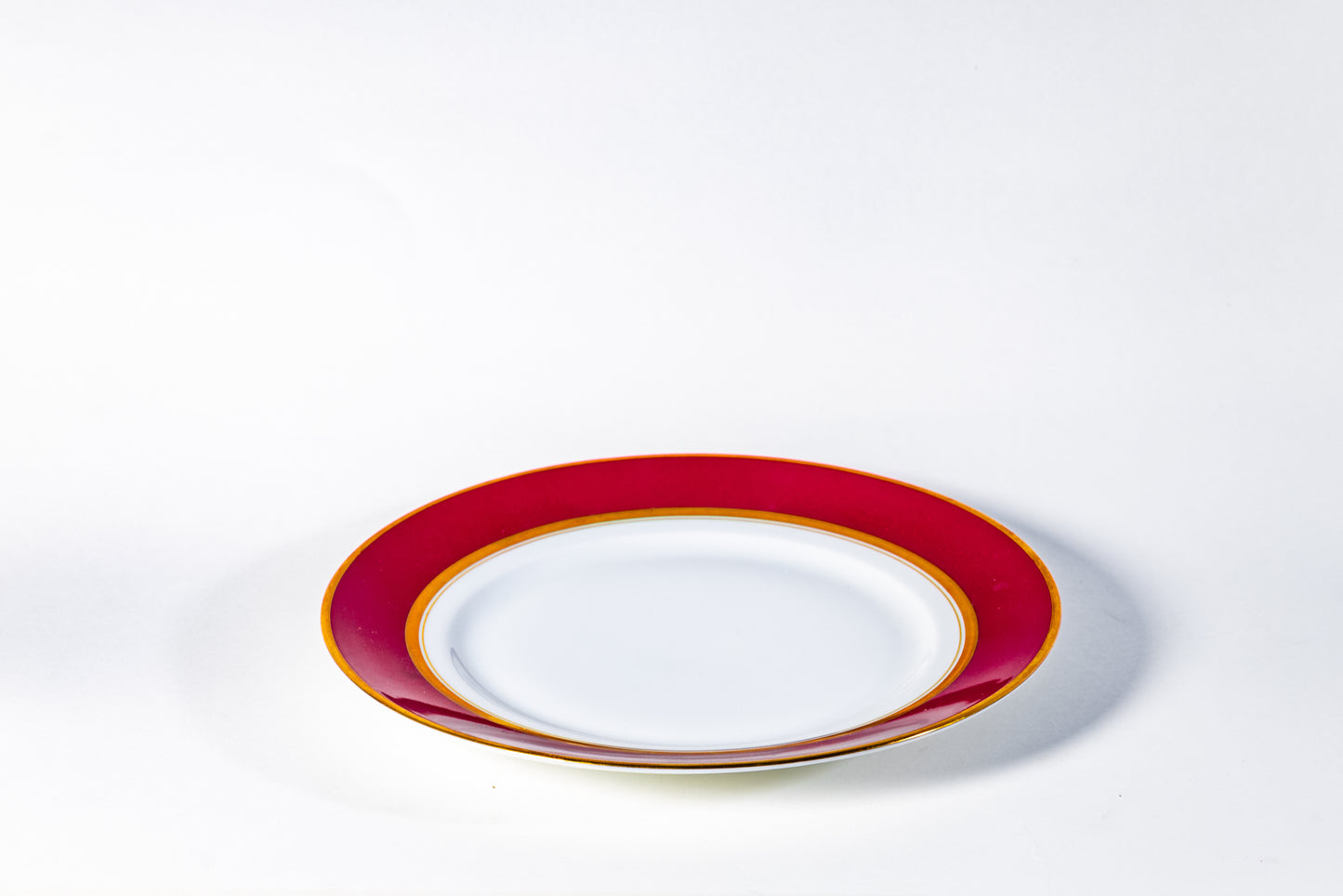 “Rococo Ruby” Porcelain Teacup and Saucer by Hutschenreuther