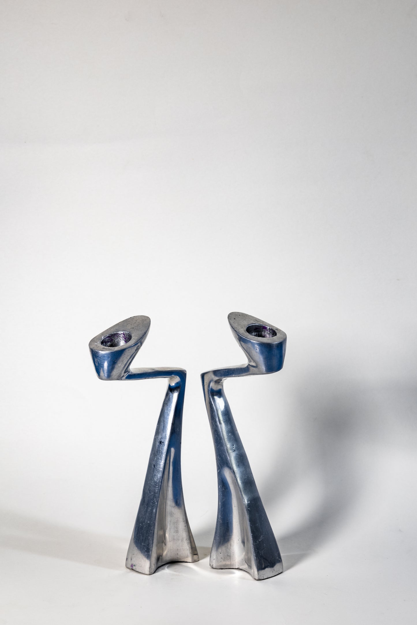 Matthew Hilton “Swan” Candle Holder – Sculptural Elegance in Solid Metal, Modern British design with organic fluidity