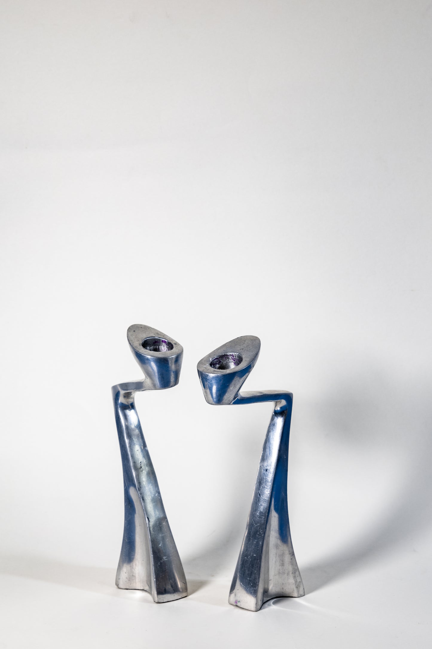 Matthew Hilton “Swan” Candle Holder – Sculptural Elegance in Solid Metal, Modern British design with organic fluidity