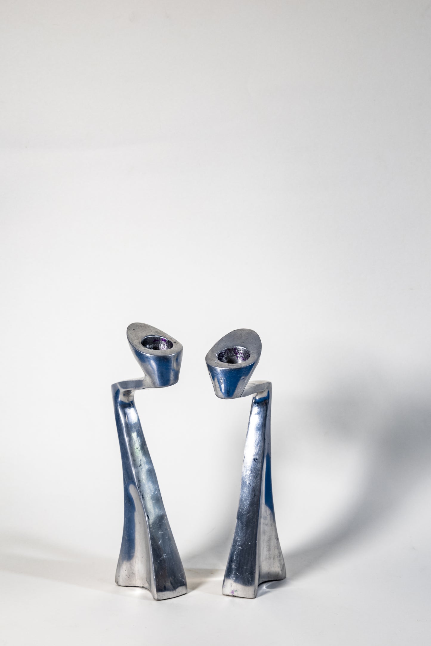 Matthew Hilton “Swan” Candle Holder – Sculptural Elegance in Solid Metal, Modern British design with organic fluidity